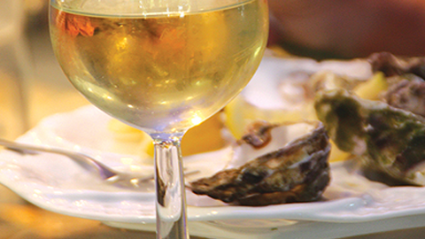 Food - Fresh from the Sea glass of wine and oysters