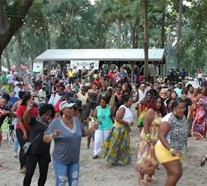 Reggae Pon De River Music Festival. people outdoors dancing